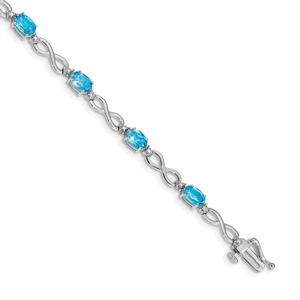 14k White Gold Blue Topaz and Diamond Infinity Bracelet 7 inches