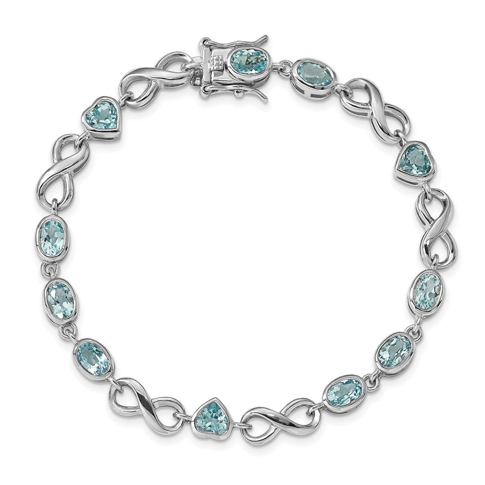 Sterling Silver Rhodium-plated Oval Heart Blue Topaz Bracelet 7 inches
