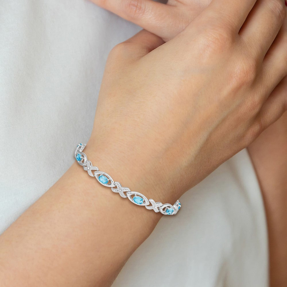 Sterling Silver Rhodium-plated Diamond & Light Swiss Blue Topaz Bracelet 7 inches