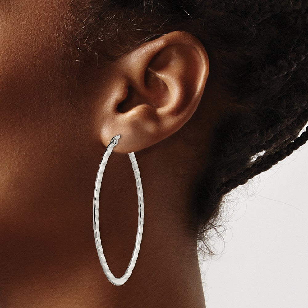 Stainless Steel Polished and Textured Oval Hoop Earrings