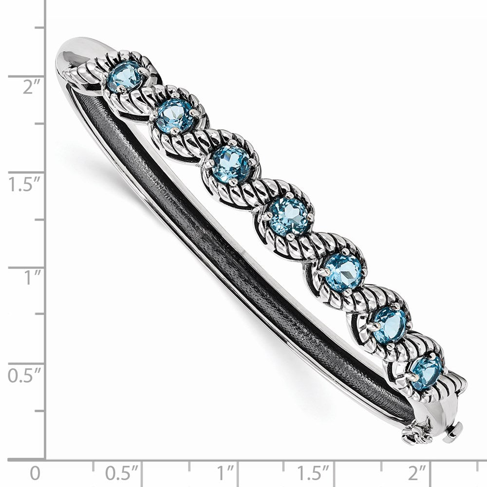 Sterling Silver Rhodium-plated Light Swiss Blue Topaz Hinged Bangle 7.25 inches
