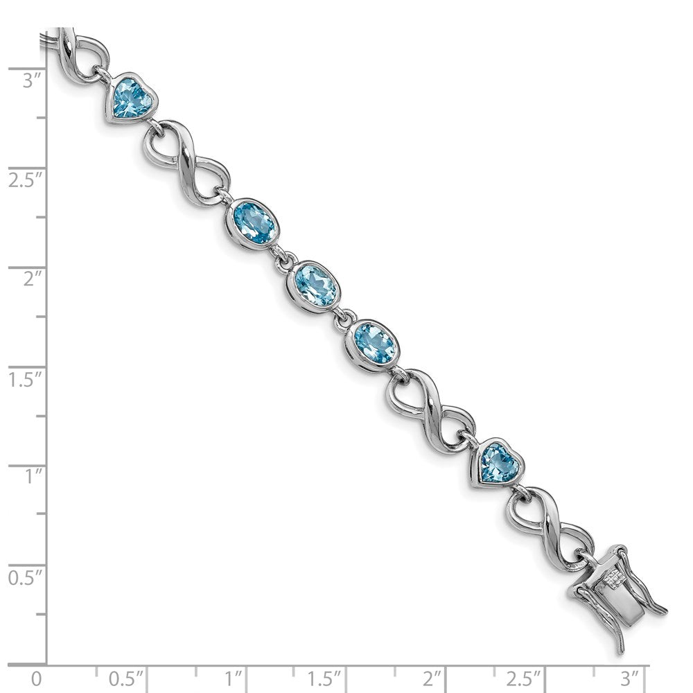 Sterling Silver Rhodium-plated Oval Heart Blue Topaz Bracelet 7 inches