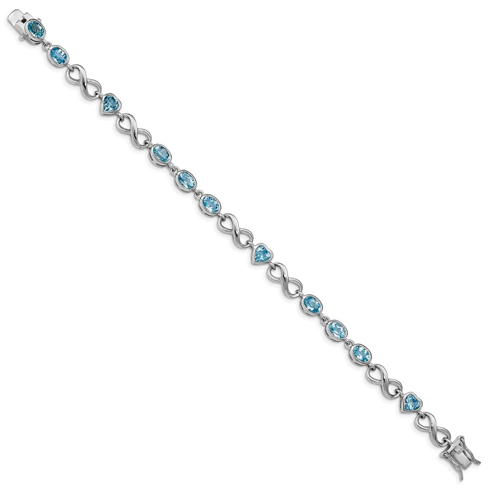 Sterling Silver Rhodium-plated Oval Heart Blue Topaz Bracelet 7 inches