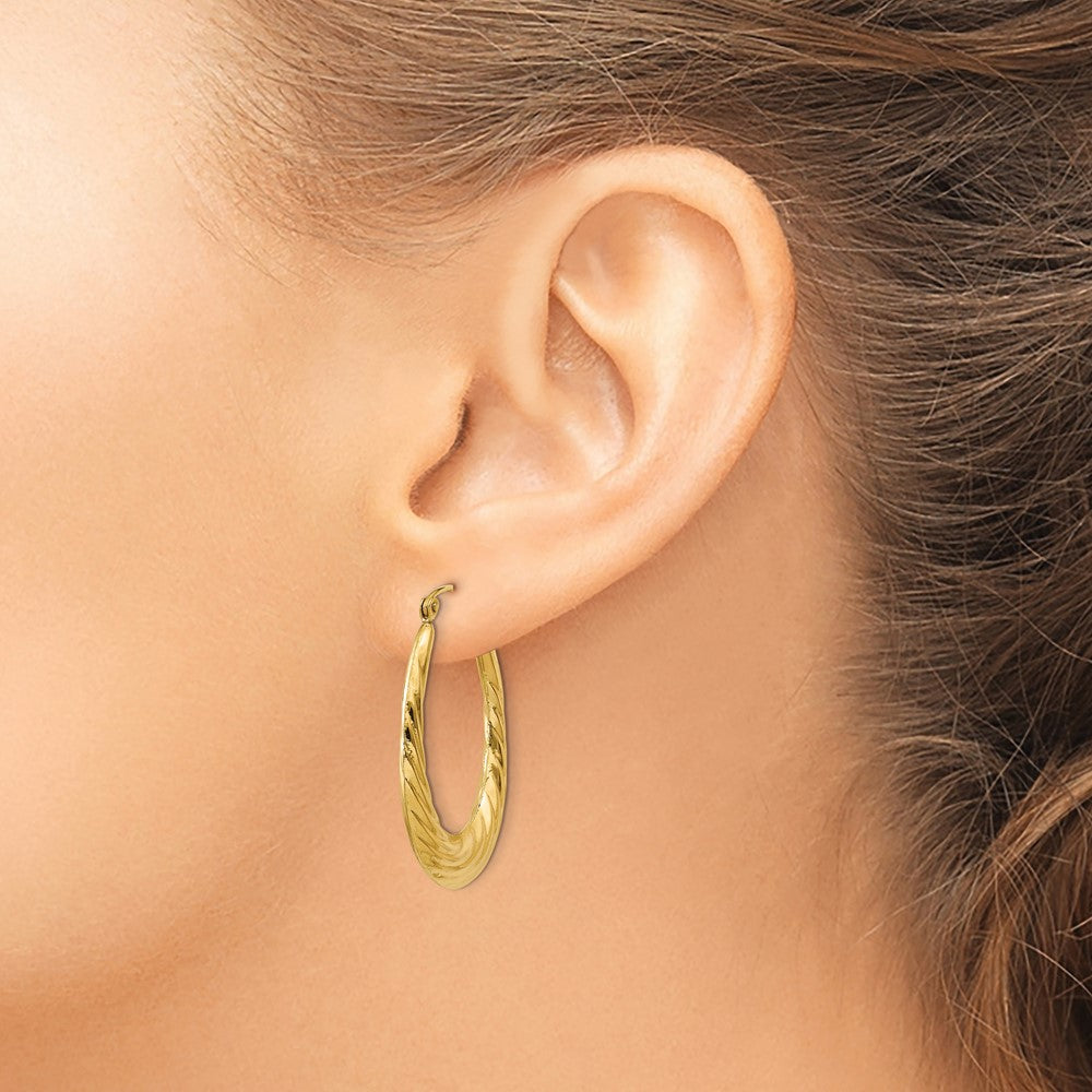 10k Polished Twisted Oval Hollow Hoop Earrings