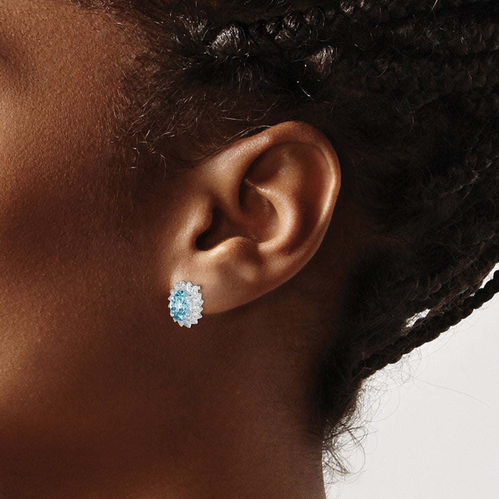 Sterling Silver Rhodium Plated Blue Topaz and Diamond Post Earrings