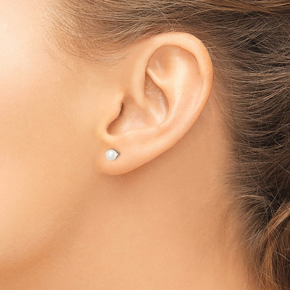 Sterling Silver Madi K Rhodium-plated 4-5mm White Round Freshwater Cultured Pearl Post Earrings